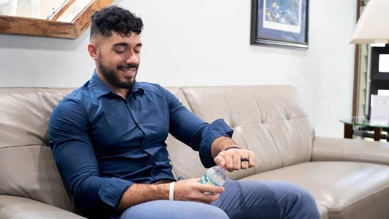 Patient enjoying a refreshment while at Bayshore Family Dental in Dunedin Florida